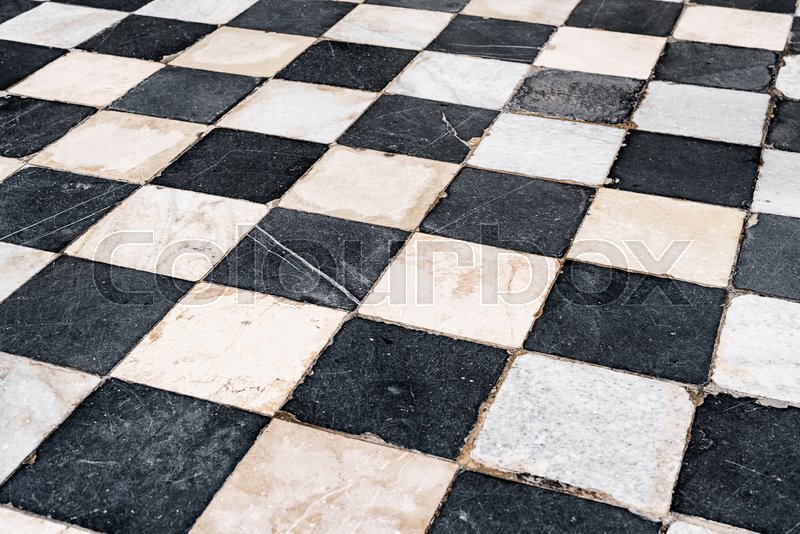 Black and white checkerboard tiles, old Stock image Colourbox