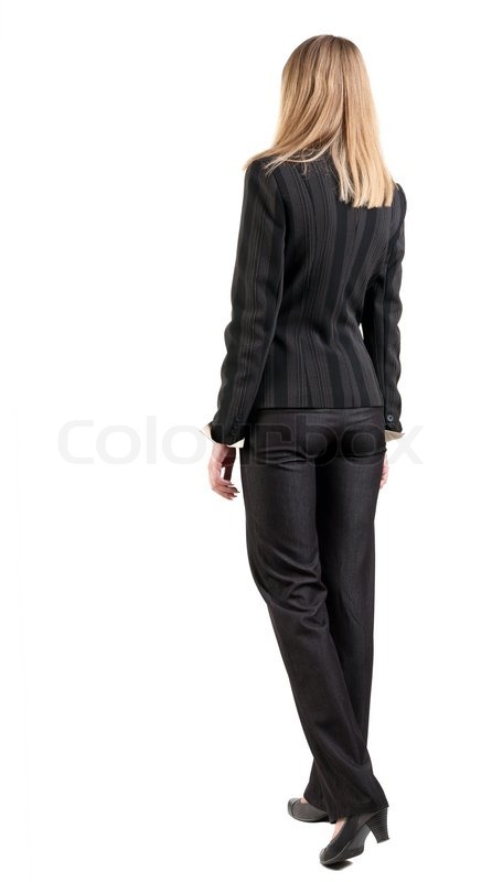 back view of walking business woman stock photo colourbox