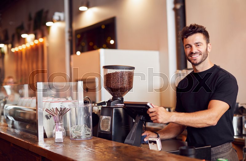 Portrait Of Male Coffee Shop Owner Stock image Colourbox