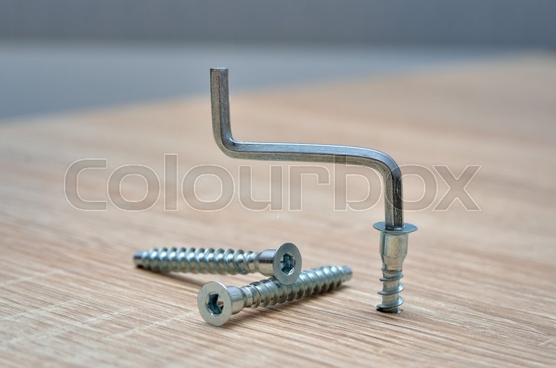 Furniture assembly tools on a wooden ... | Stock image | Colourbox