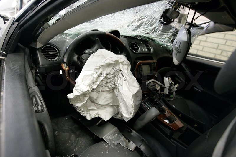 Interior of a crashed car with airbag Stock Photo Colourbox