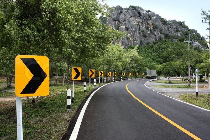 curve road sign on
