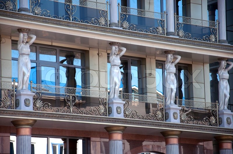 Modern Greek Architecture caryatids on the facade of a modern building, stylized greek style Modern Greek Architecture caryatids on the facade of a modern building, stylized greek style