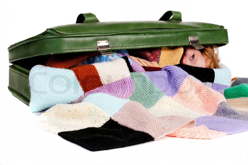 Girl hidden in a suitcase Stock image Colourbox
