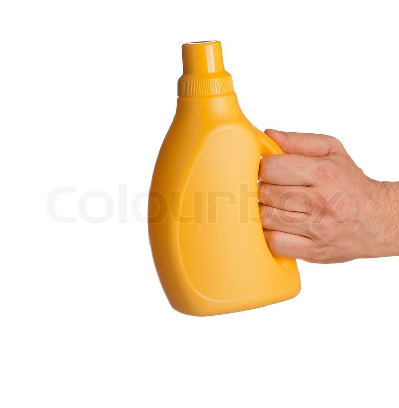 Yellow cleaner bottle in hand isolated Stock image Colourbox