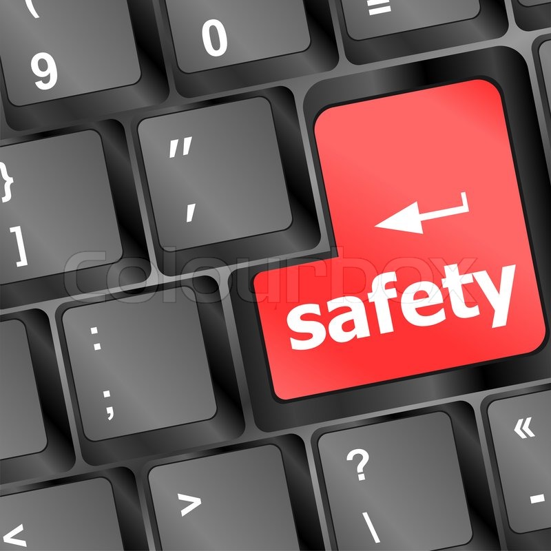 Safety first concept with red key on computer keyboard | Stock Photo