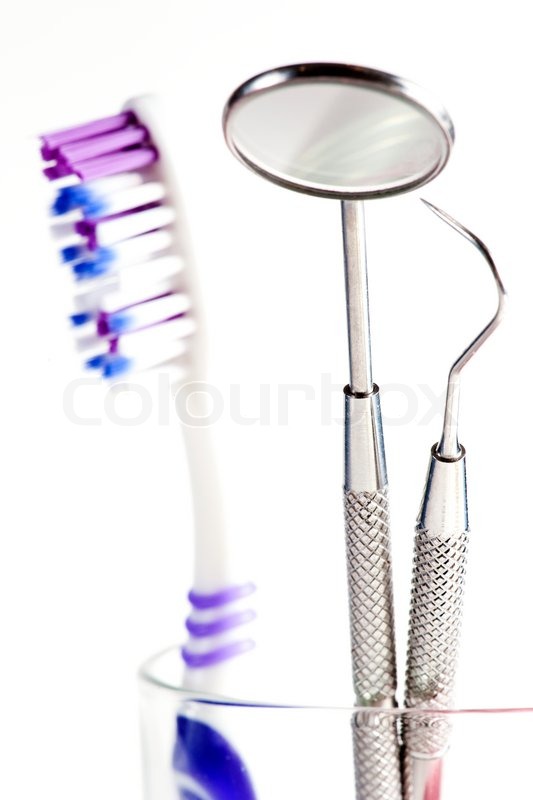 Toothbrush and Dental mirror explorer Stock image Colourbox