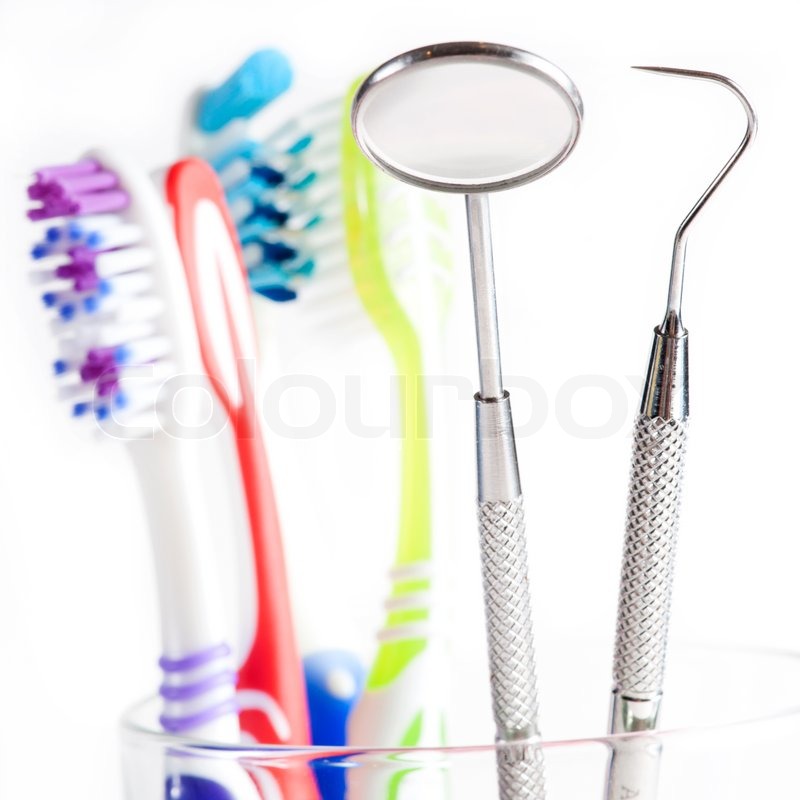 Toothbrush and Dental mirror explorer Stock image Colourbox