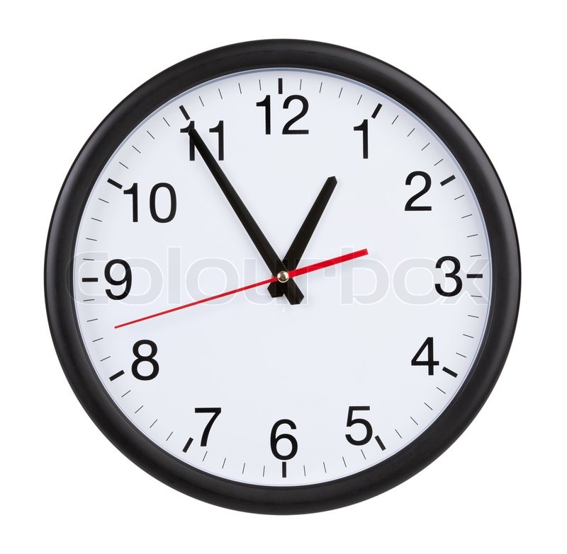 Round office clock shows five minutes | Stock image | Colourbox