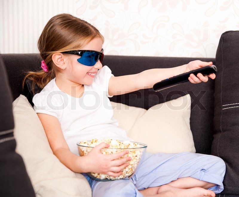 little girl watching tv stock image colourbox little girl watching tv stock image colourbox