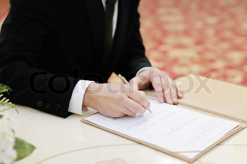 Hand Signing On Marriage Certificate