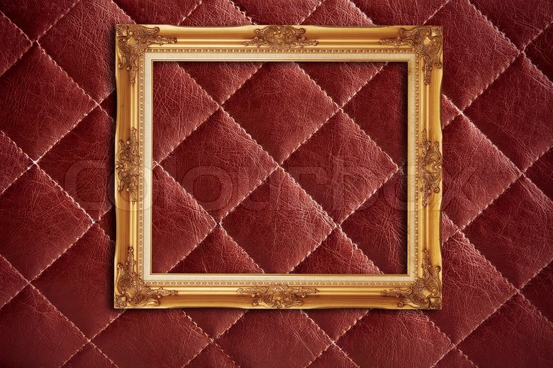 Goldenen Rahmen auf rotem Leder | Stock Bild | Colourbox