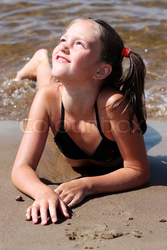 Little Girl Playing On Sand Beach Stock Image Colourbox