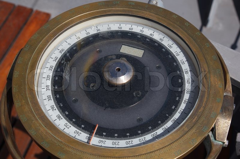 Large ship compass on board Stock image Colourbox