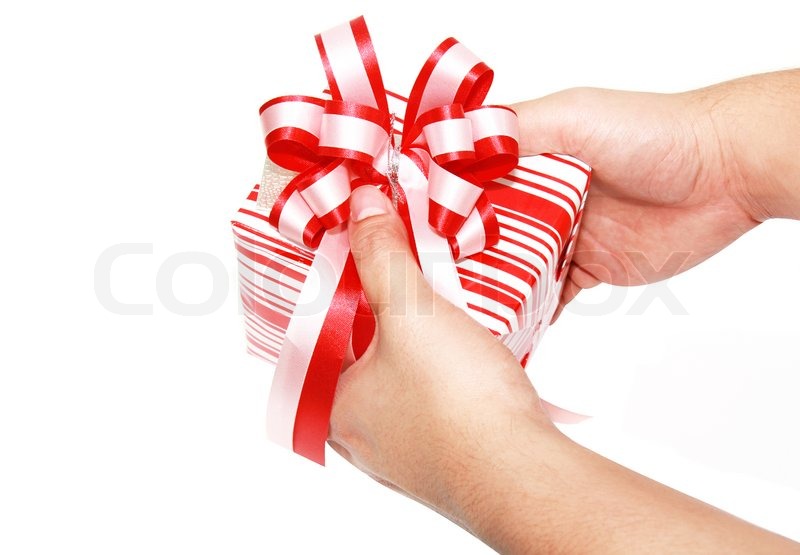 Isolated hand with a present in a hand | Stock image | Colourbox