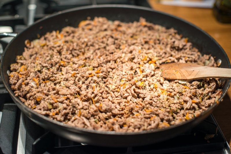 Minced meat in frying pan Stock image Colourbox