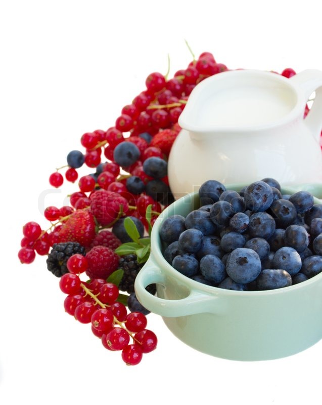 Mix of fresh berries with milk isolated Stock image Colourbox