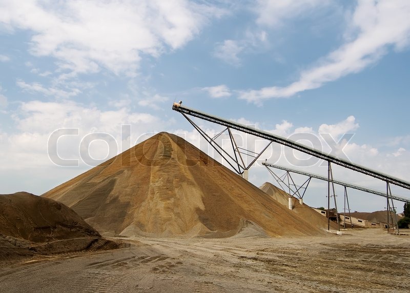 Conveyor belts with piles of gravel Stock image Colourbox