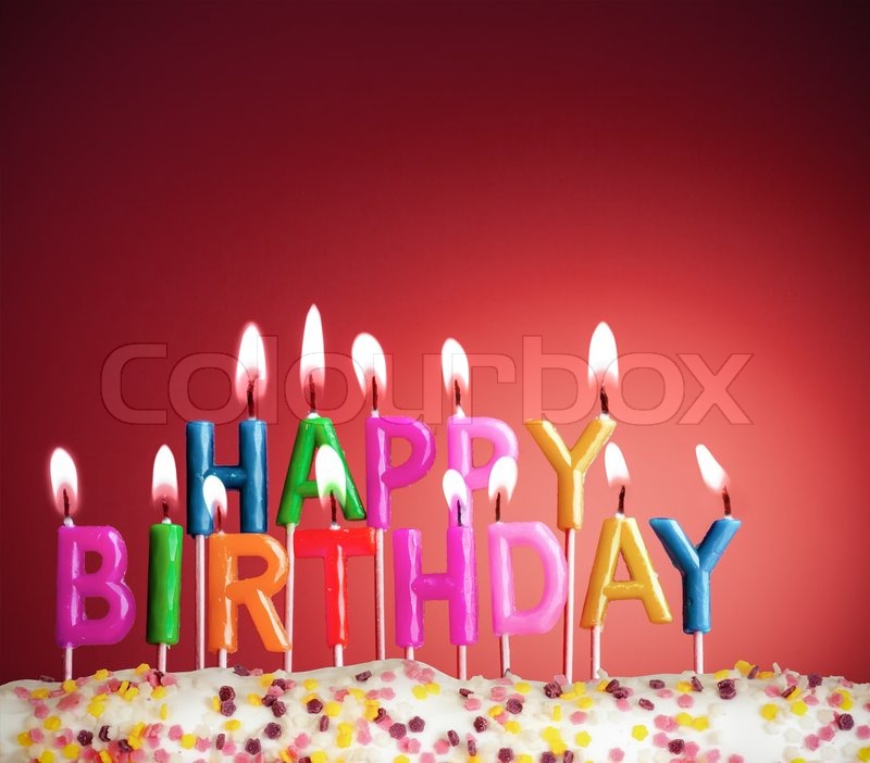 happy birthday lit candles on red background stock photo colourbox