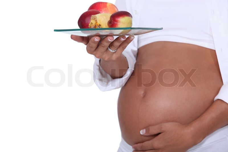 Body of pregnant woman | Stock image | Colourbox