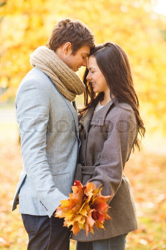 romantic couple kissing in the autumn park | Stock image | Colourbox