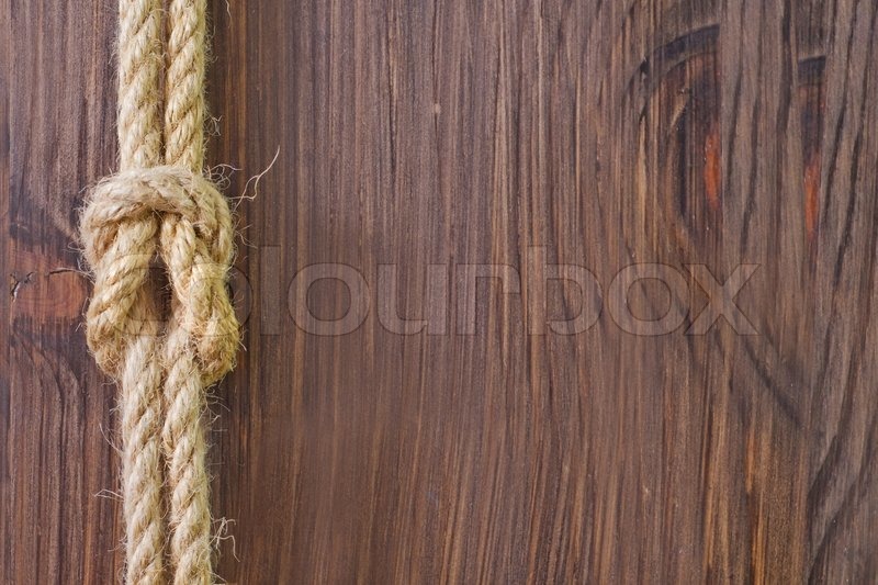 Rope on wooden backgrounds | Stock image | Colourbox