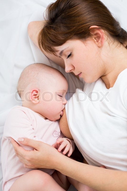 mother feeding baby