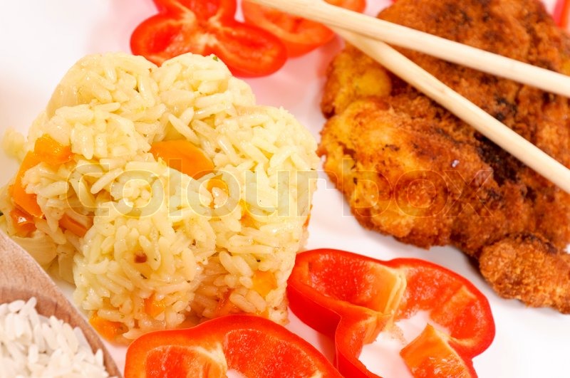 Prepared rice with vegetables. Stock image Colourbox