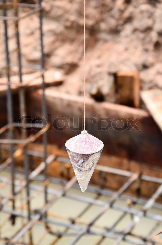Plumb bob on building site background Stock image Colourbox