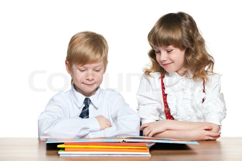 Two Red Haired Kids Are Reading At The Stock Image Colourbox