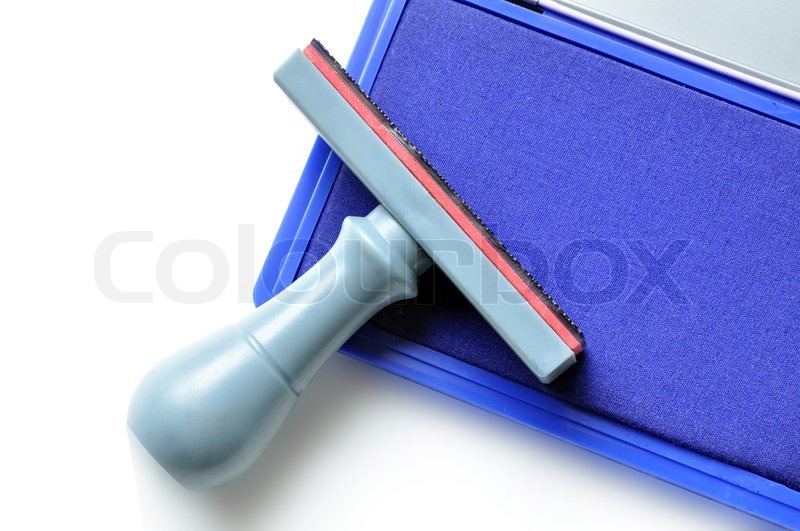Rubber stamp on blue ink pad Stock image Colourbox