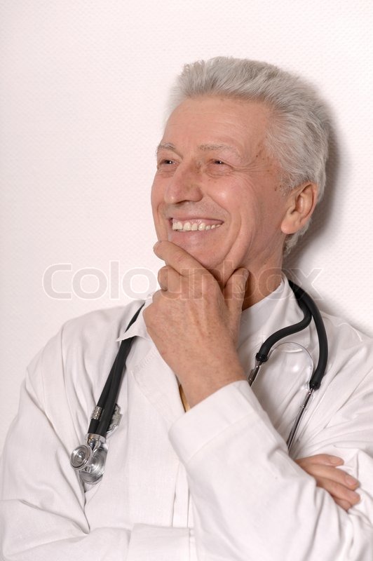 Elderly doctor is on a white background | Stock image | Colourbox