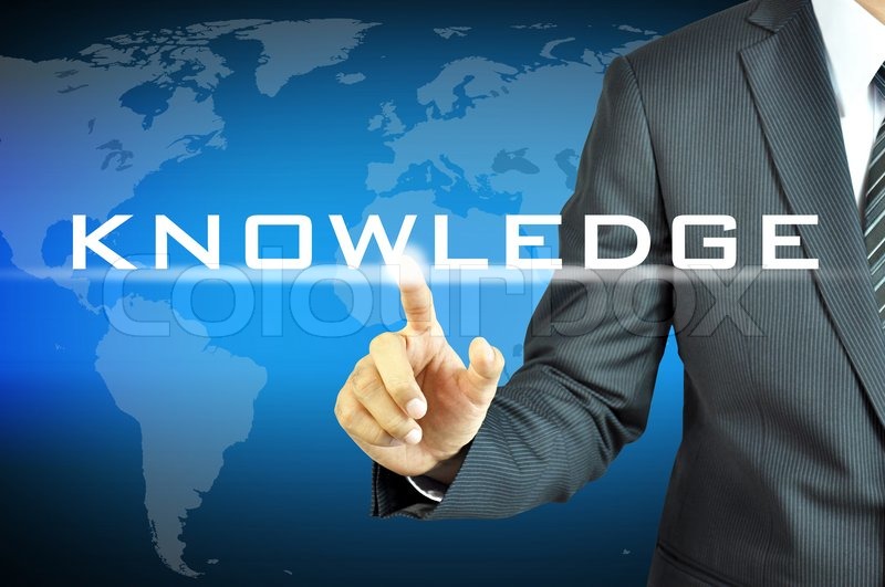 Businessman touching KNOWLEDGE sign on ... | Stock image | Colourbox