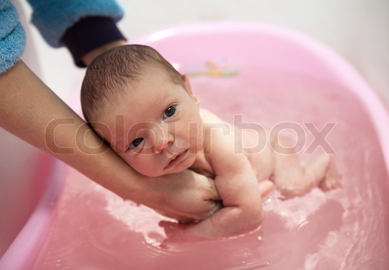 Mom Bathing Cute Baby Boy In Bath Stock Photo Colourbox