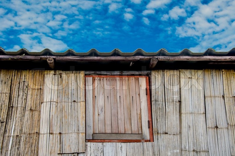 Wood window on bamboo wall | Stock image | Colourbox